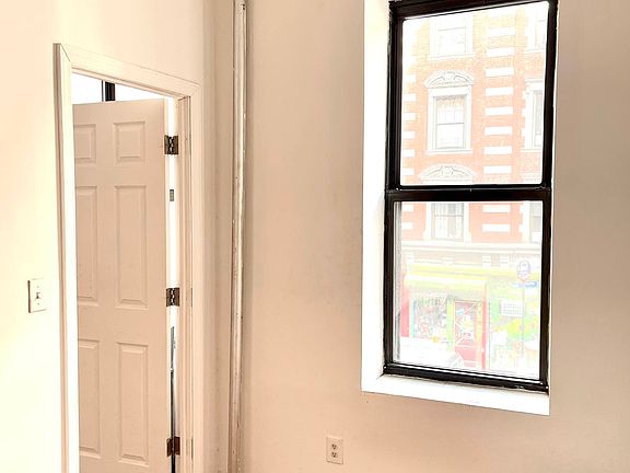 4th image of 240 E 9th St APT 3
