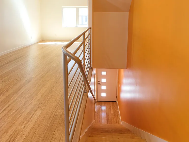 Entrance Stairway Leading Down to Front Door