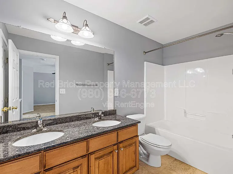 9425 Shumacher Ave NW — Photo 24