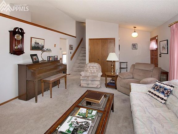 Entryway into Living Room with a large Coat Closet.
