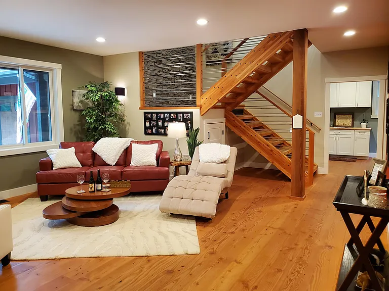 The "Diva Den" is located near the entry of the home, no TV, just comfortable seating to lounge and read a book, or invite friends over to catch up on life.