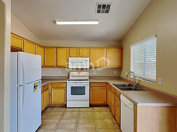 3rd image of 14970 W Port Au Prince Ln