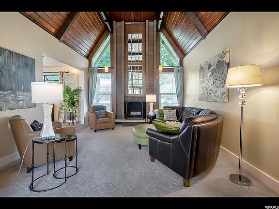 FAMILY ROOM FEATURES VAULTED TONGUE AND GROOVE CEILING.