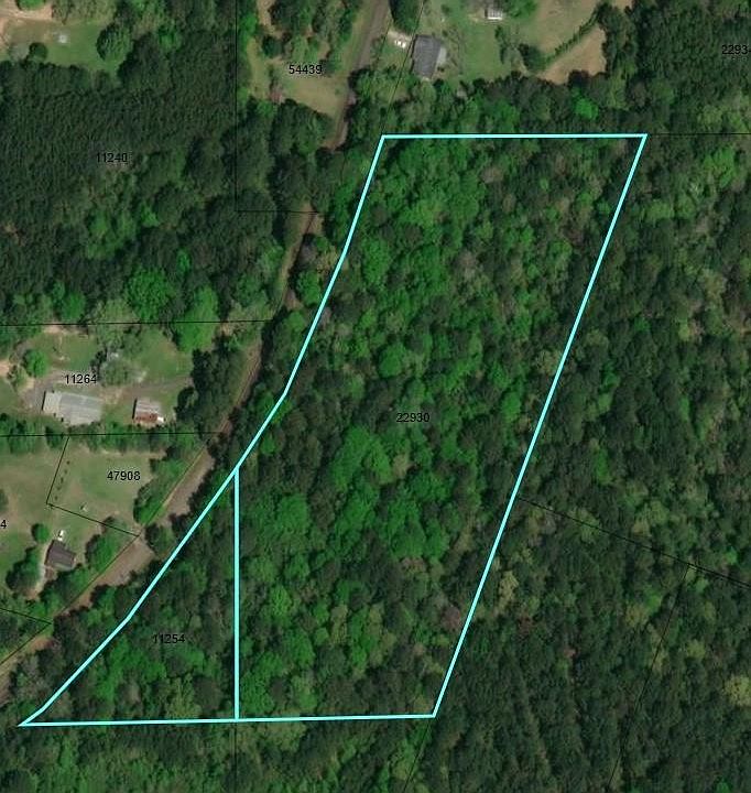 2 wooded lots for a total of 9.952 acres.