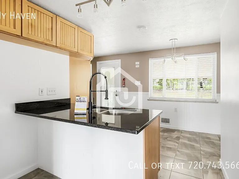2567 S Stuart St — Photo 1