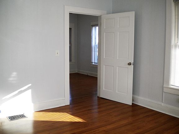Living room viewing into dining room