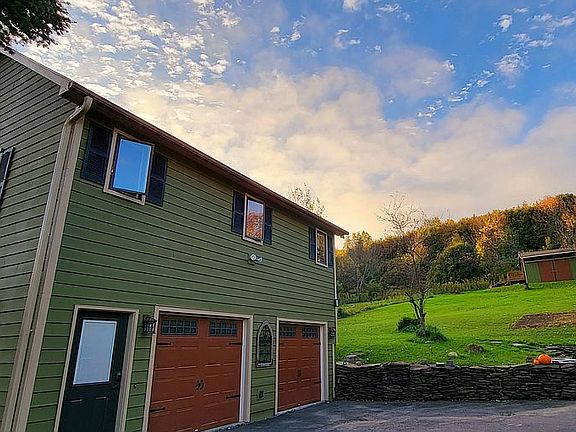 Home, side, 2 stall garage