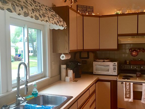 Lit cabinets in kitchen