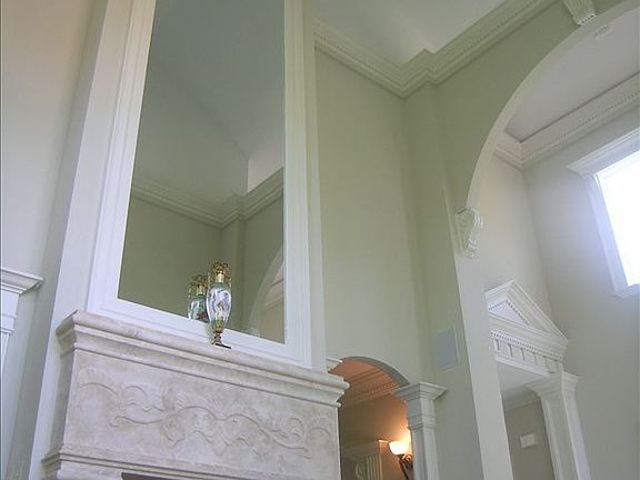 2 story fireplace with limestone in living room