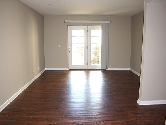 Spacious living room with access to semi-private patio, perf