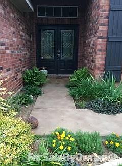 front entry
						:
						lush landscaping with easy-care irrigation system
