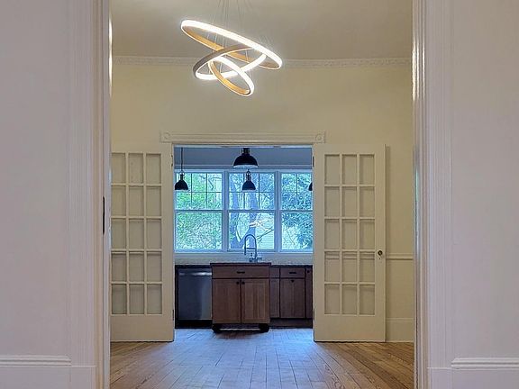 View from living room to main kitchen