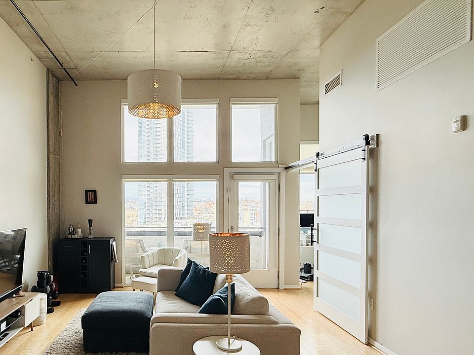 15' ceilings and huge windows with mountain views