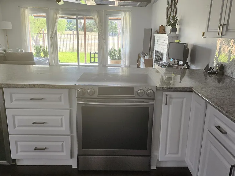 Electric range and exhaust