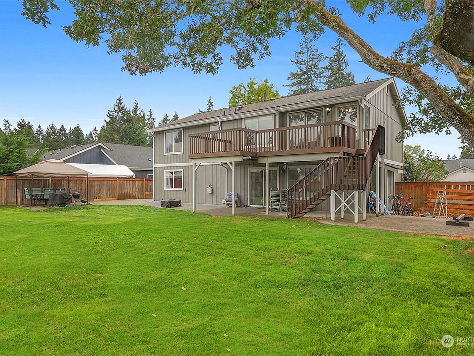 Level & fenced back yard>