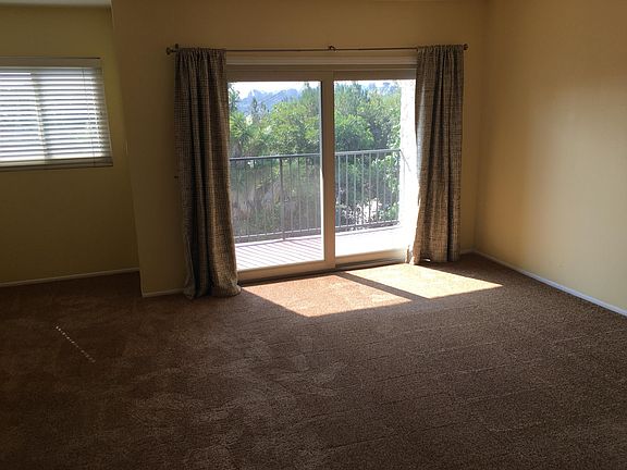 Very large bedroom with walk in closet and an additional sliding door closet. View faces east. Sound proof windows.
