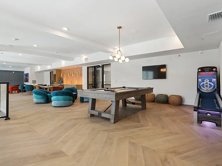 Social Lounge with TVs, Games, and Relaxing Spaces