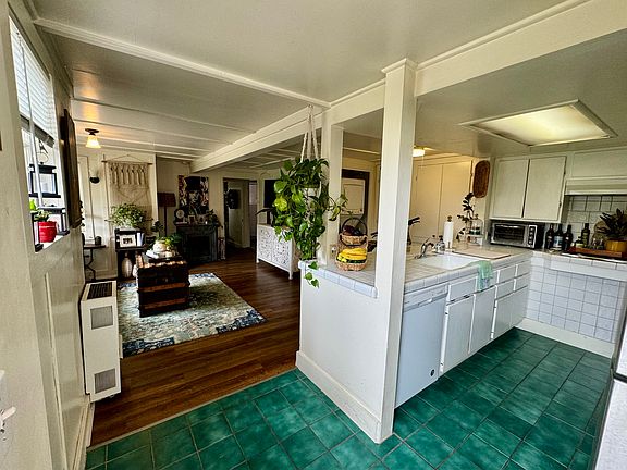 Entry with view to Kitchen & Living