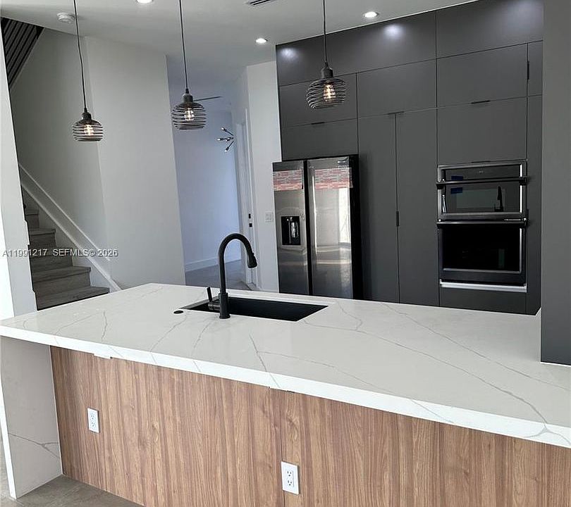 1st image of 4625 SW 32nd Ave #Townhouse 1c