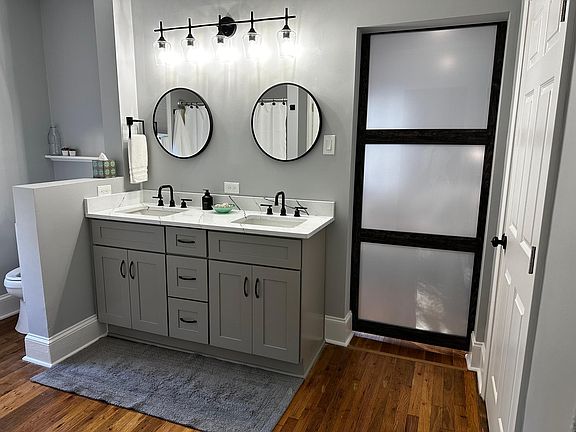 Master en-suite bathroom with barn door