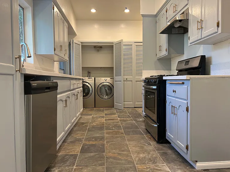 Kitchen with washer / dryer