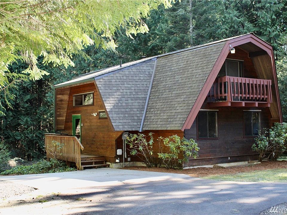 Welcome to your cozy cabin in the woods. This is a Justus cedar home located on 2.17 very private acres of land, yet so very close to town. Plenty of parking and a circular driveway. Room to build a detached garage on the property too.