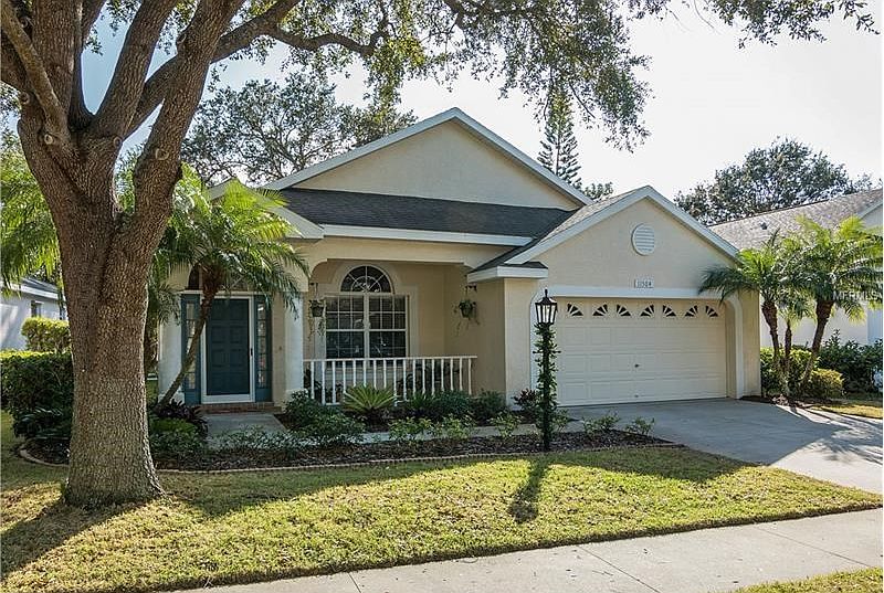Front view, 2 car garage, Florida friendly landscaping