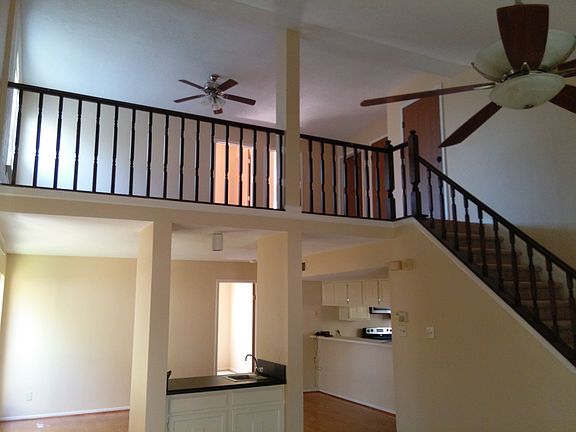 View from LR toward dining room, kitchen and 2nd floor game