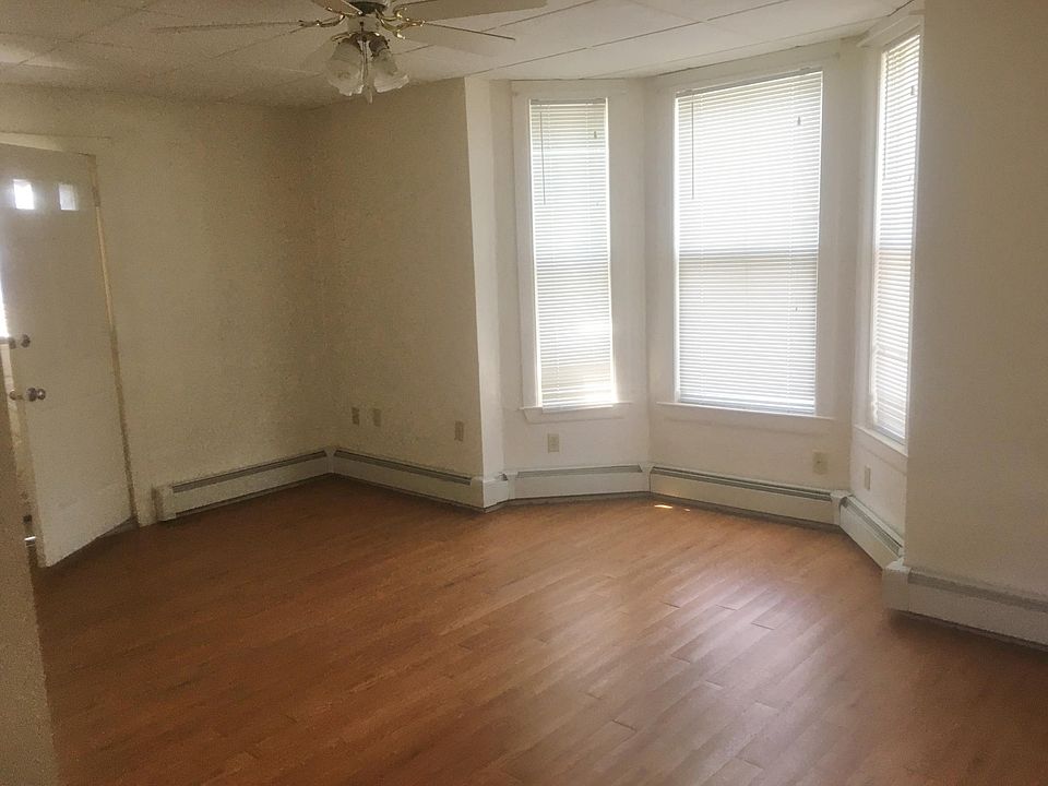 Light-filled living room and entrance.