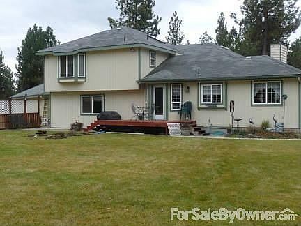 b k of house
						:
						back deck and patio off kitchen