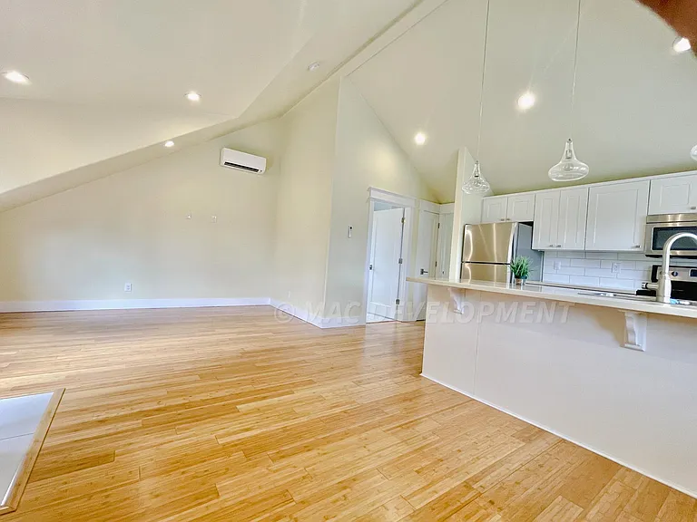 Vaulted Ceilings in this Open Concept living