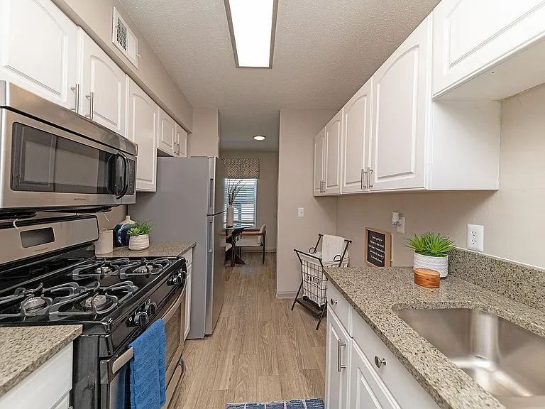 Kitchen with granite counters and stainless appliances