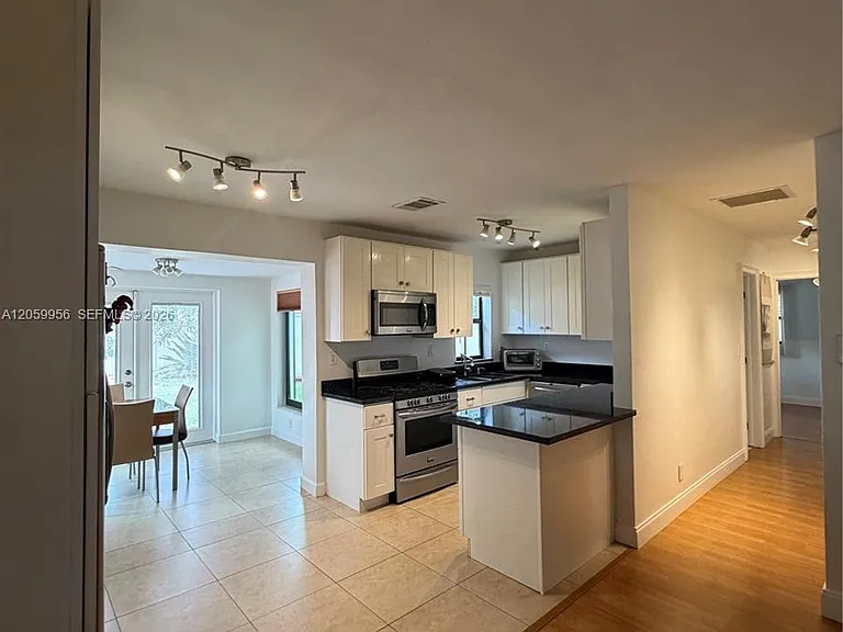 6717 Raleigh St — Photo 11