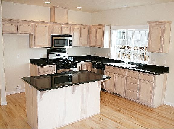 "Island" kitchen w/slab granite 