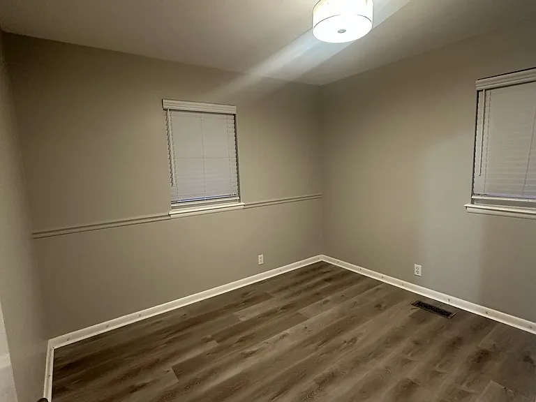 Bedroom 2 Newer Lighting . Flooring and Paint.