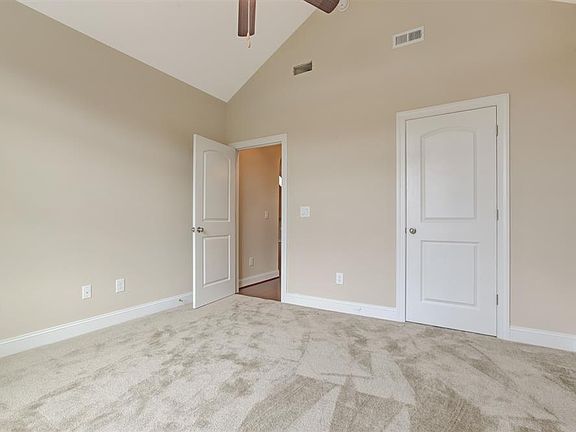 Second bedroom with vaulted ceiling