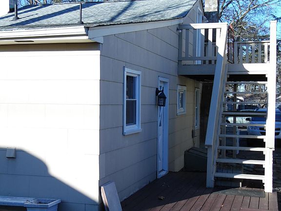 Steps that lead to a 3rd bedroom with a half bath.