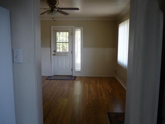 Living Room -hardwood floors/detailed wainscoat 