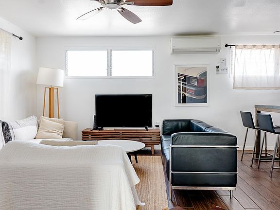 Gather around your cozy living room equipped with high powered air conditioning.