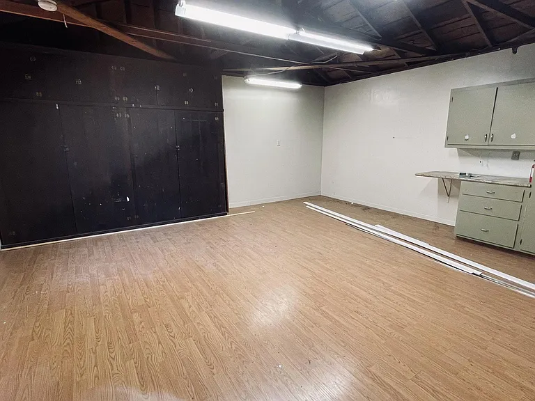 Semi finished 400 sq ft. garage which can be used as play room / gym / office.