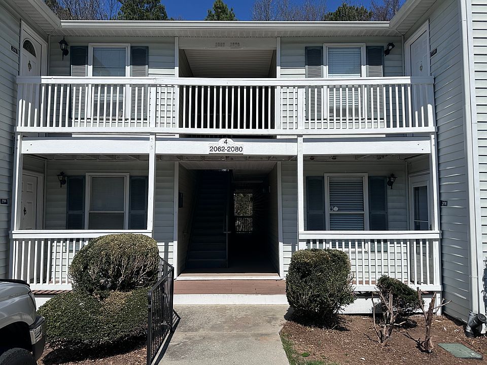 Front of building - unit is on the same level as parking