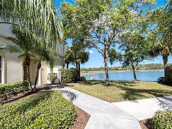 The front elevation depicts unique architecture and the staggered two car garage.