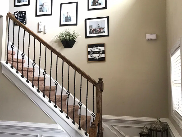 Stairs to the right when you walk into the house.