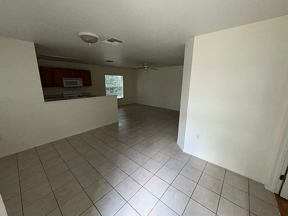 Entry, dinning room, kitchen, living room viewed from front door.