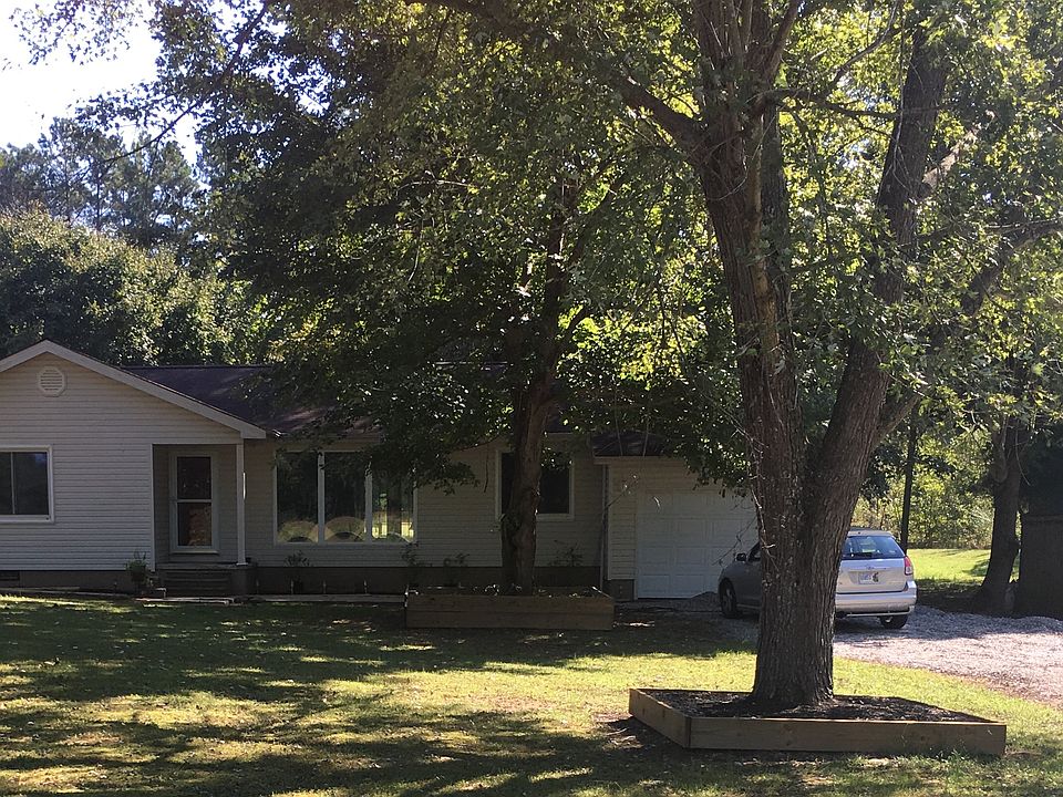 2 acres, shady lot, pond