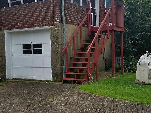 garage and rear steps to screened porch