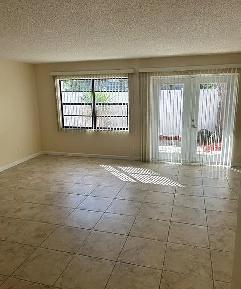 Great Room looking at French door leading to fenced back yard