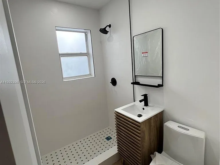 7035 NE 4th Ct #4 — Photo 1