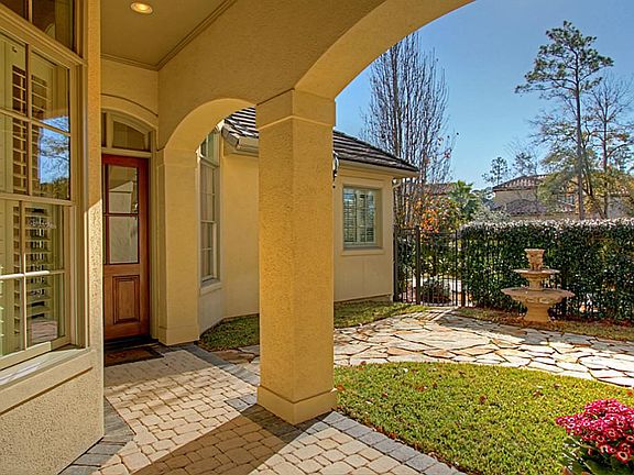 Access the front door through the courtyard.