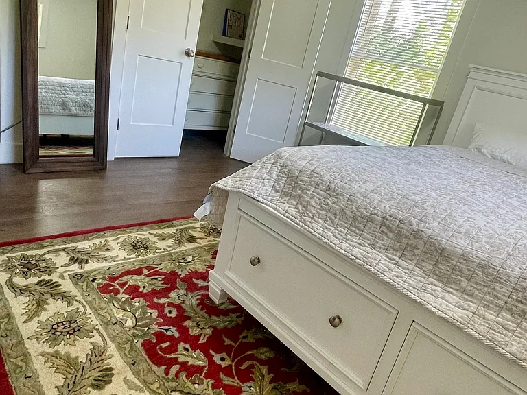 Linens and blankets in under the bed drawers.